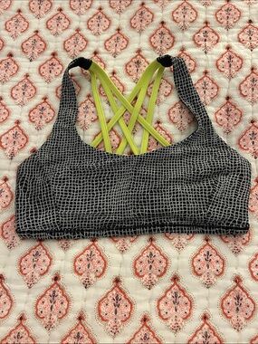 lululemon women’s Black Grid Sports Bra with Neon Yellow Strappy Back